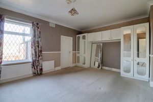 Bedroom One- click for photo gallery